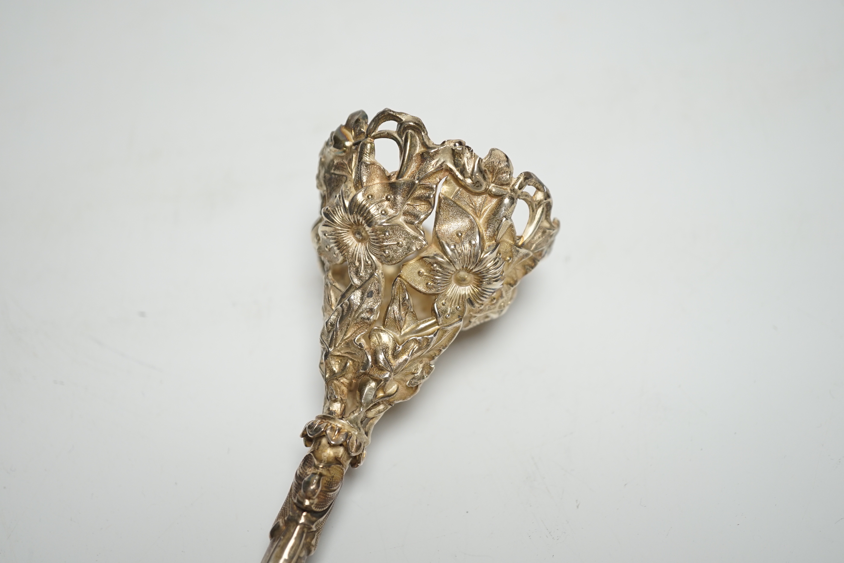 A white metal posy holder, 11.5cm.